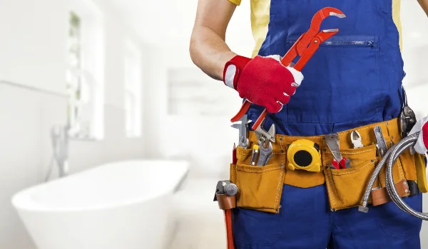 The torso of plumbing technician showing a tool belt from TMK Plumber Austin in Kyle, TX - Kyle TX